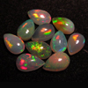 calebrated size - Ethiopian Opal - really - tope grade high quality CABOCHON - tear drops shape each pcs - have amazing - beautifull - flashy fire all around in the stone - huge size -5x8 mm approx 10 pcs -- STUNNING QUALITY - VERY VERY RARE